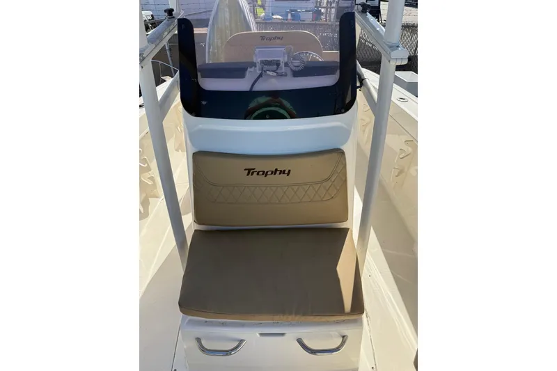 Slide: The Image of 2022 2 Bar T22 CX boat console with Trophy branding and cushioned seating. - 15