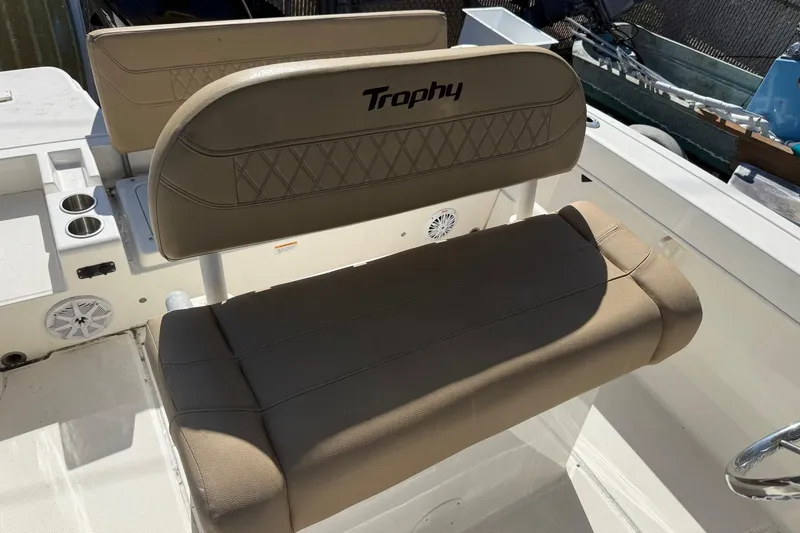 Slide: The Image of Boat seating on a 2022 2 Bar T22 CX, featuring "Trophy" branding. - 16