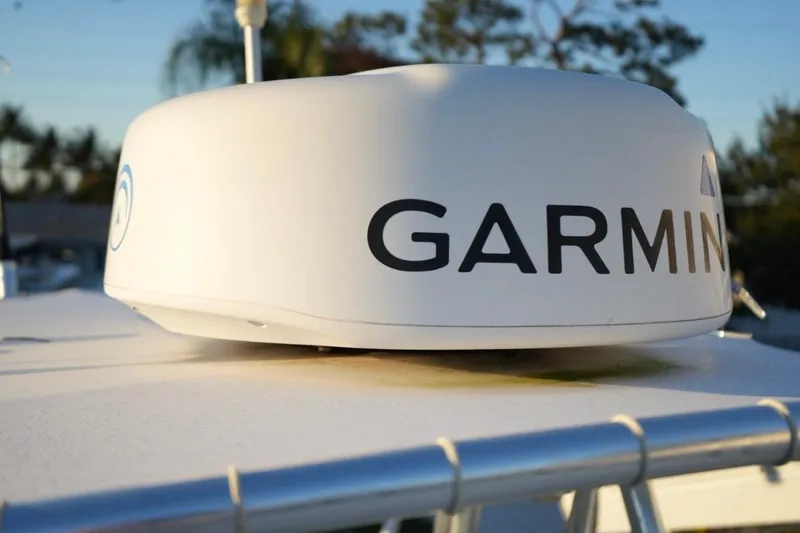 Slide: The Image of Garmin radar on 1999 Regulator 26 Forward Seating boat, close-up view. - 11