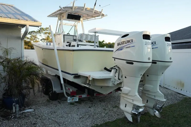 Slide: The Image of 1999 Regulator 26 Forward Seating boat with dual Suzuki 200 horsepower engines. - 2