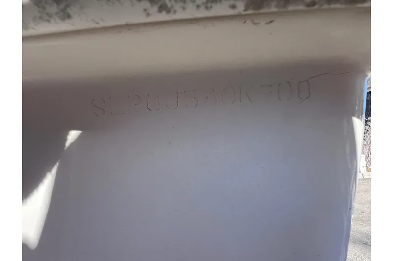 Slide: The Image of Hull identification number on 2008 Scout 205 Dorado boat. - 13