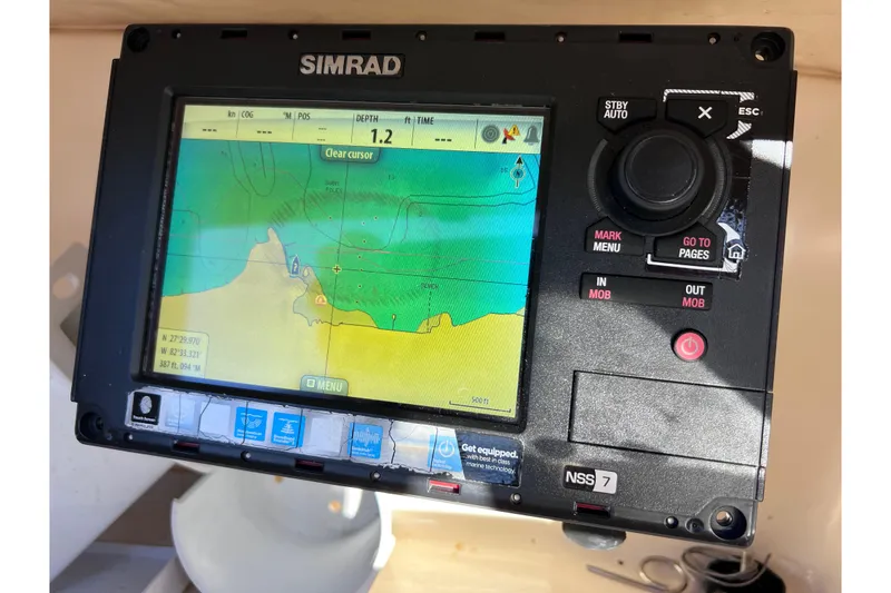 Slide: The Image of Simrad navigation system on 2008 Scout 205 Dorado boat, displaying marine map. - 26