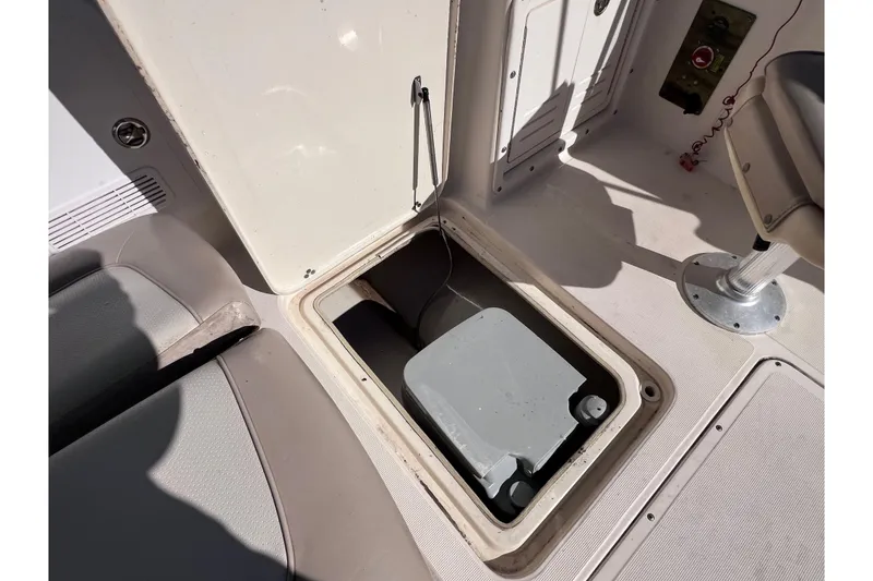 Slide: The Image of Open storage compartment on 2008 Scout 205 Dorado boat deck. - 35