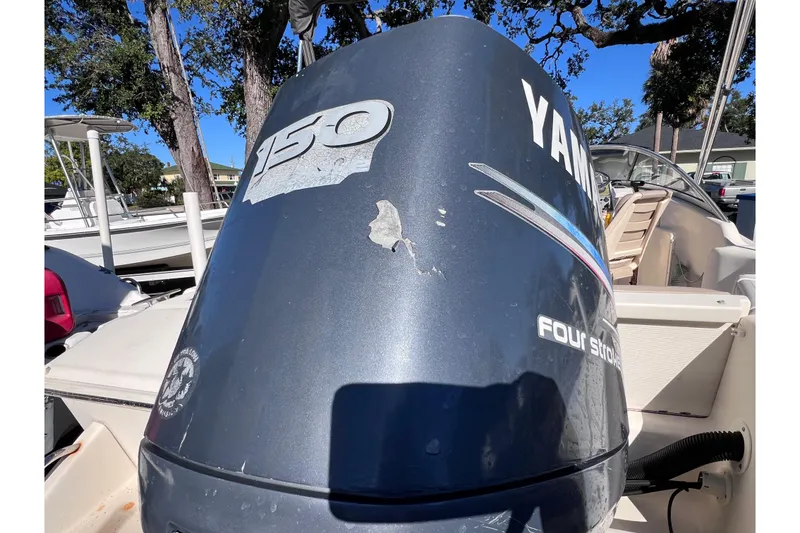 Slide: The Image of 2008 Scout 205 Dorado with Yamaha 150 outboard motor, four-stroke engine. - 5