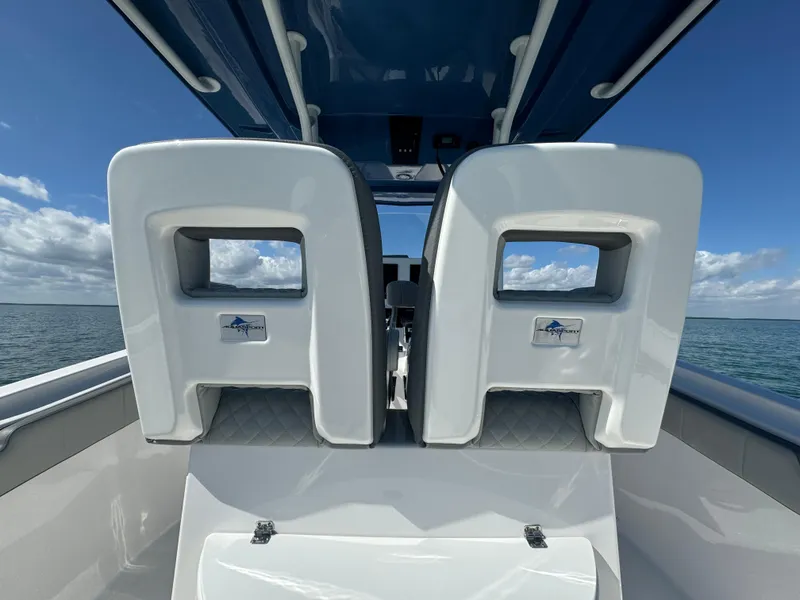 Slide: The Image of 2022 Aquasport 2500 Center Console boat seats with ocean view. - 17