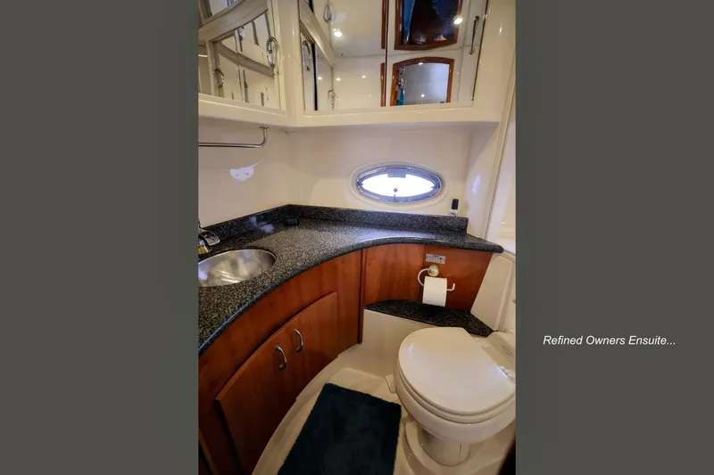 Slide: The Image of Luxurious bathroom in 2004 Carver 466 Motor Yacht with full shower and elegant fixtures. - 23