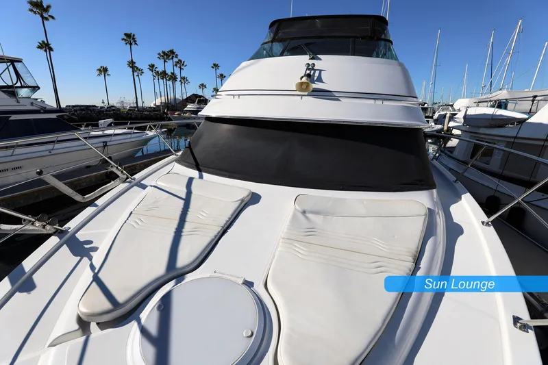 Slide: The Image of Wide side decks on 2004 Carver 466 Motor Yacht docked at marina. - 4