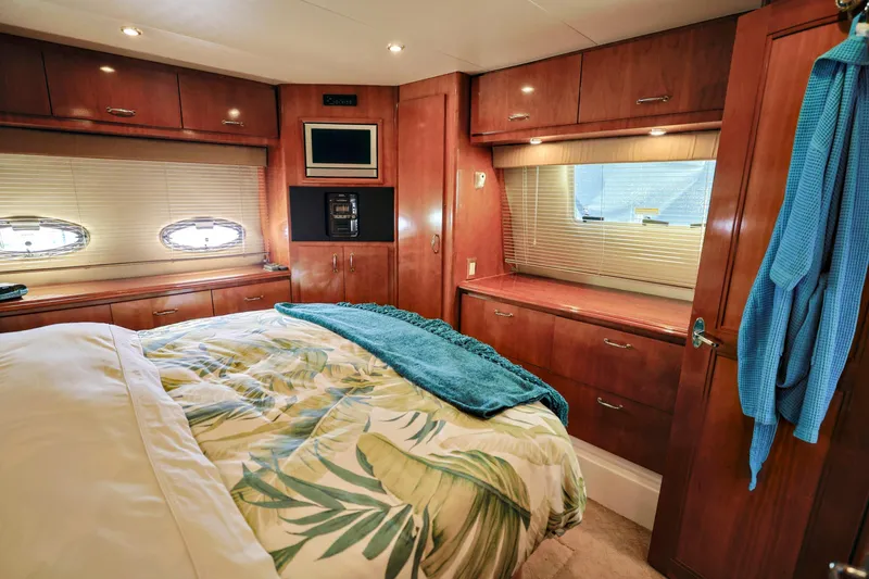 Slide: The Image of Luxurious bathroom in 2004 Carver 466 Motor Yacht with elegant fixtures and cabinetry. - 22