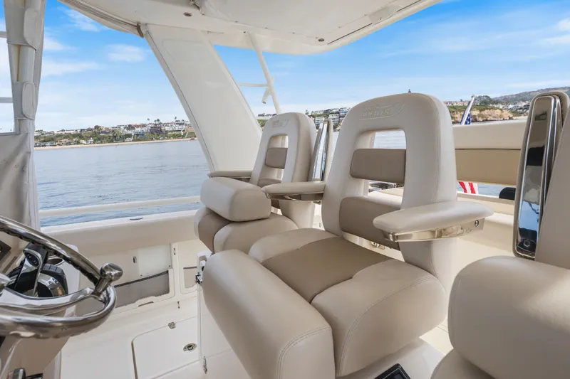 Slide: The Image of Interior of 2018 Boston Whaler 420 Outrage with luxurious seating and ocean view. - 29