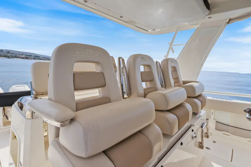 Slide: The Image of 2018 Boston Whaler 420 Outrage boat seats with ocean view. - 31
