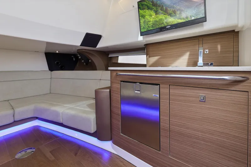 Slide: The Image of Luxurious interior of 2018 Boston Whaler 420 Outrage with modern seating and cabinetry. - 35