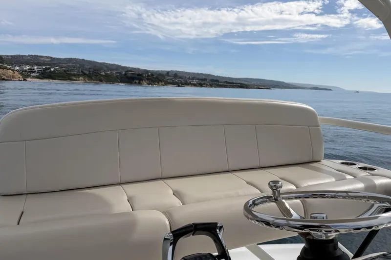 Slide: The Image of 2018 Boston Whaler 420 Outrage boat interior with ocean view and clear sky. - 50