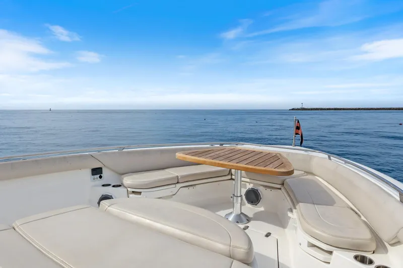 Slide: The Image of Boston Whaler 420 Outrage 2018 boat deck with seating and ocean view. - 66