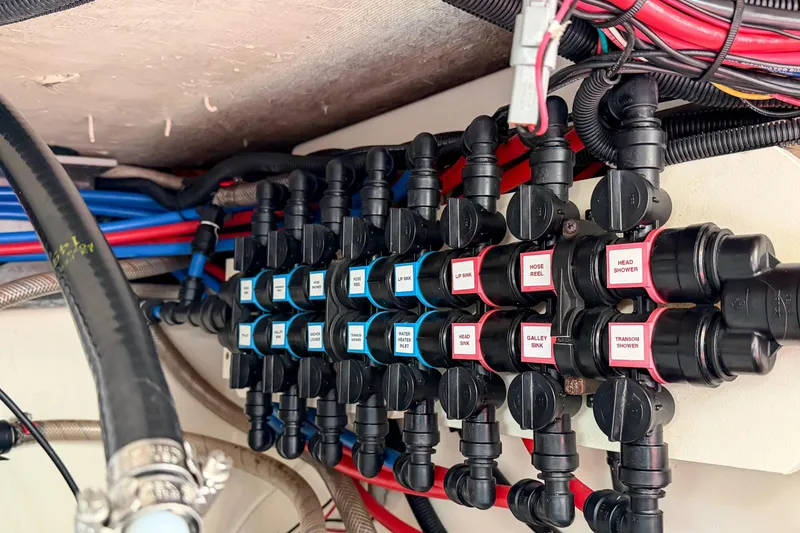 Slide: The Image of Electrical and plumbing system on a 2018 Boston Whaler 420 Outrage boat. - 75