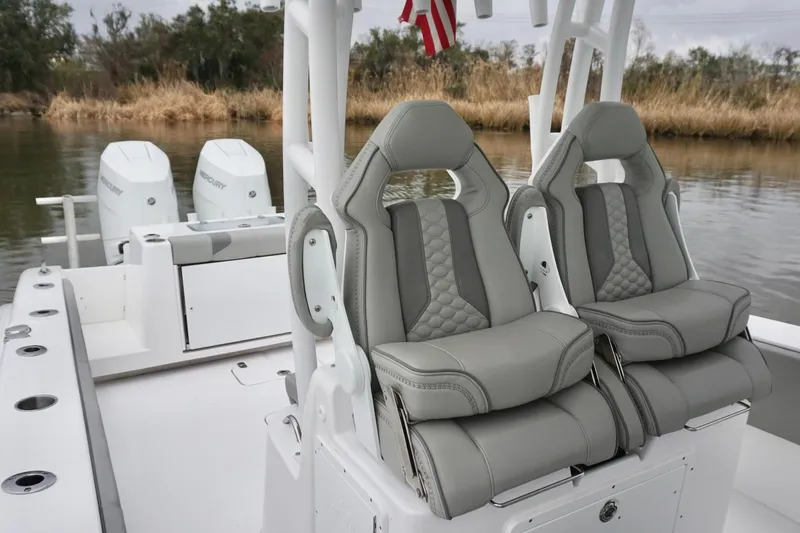 Slide: The Image of 2023 Cape Horn 34 XS boat with luxurious seating and dual Mercury engines. - 14