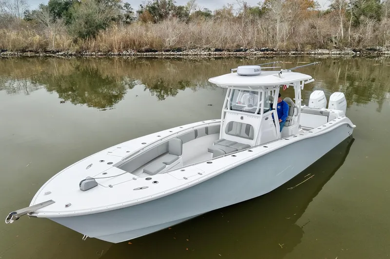 Slide: The Image of 2023 Cape Horn 34 XS boat on calm water, featuring sleek design and modern amenities. - 6