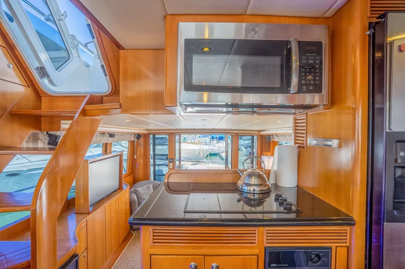 Slide: The Image of Luxury yacht kitchen with microwave and kettle, Symbol 58, year 2002. - 15