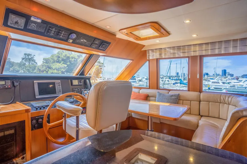 Slide: The Image of Luxurious interior of a 2002 Symbol 58 yacht in harbor. - 19