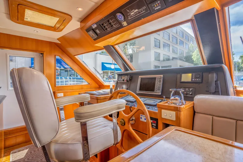 Slide: The Image of Luxurious Symbol 58 yacht cockpit, 2002 model, featuring modern navigation. - 21