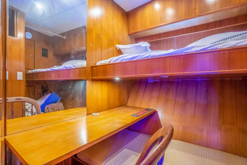 Slide: The Image of Wood-paneled sleeping area in Symbol 58 yacht, year 2002. - 28