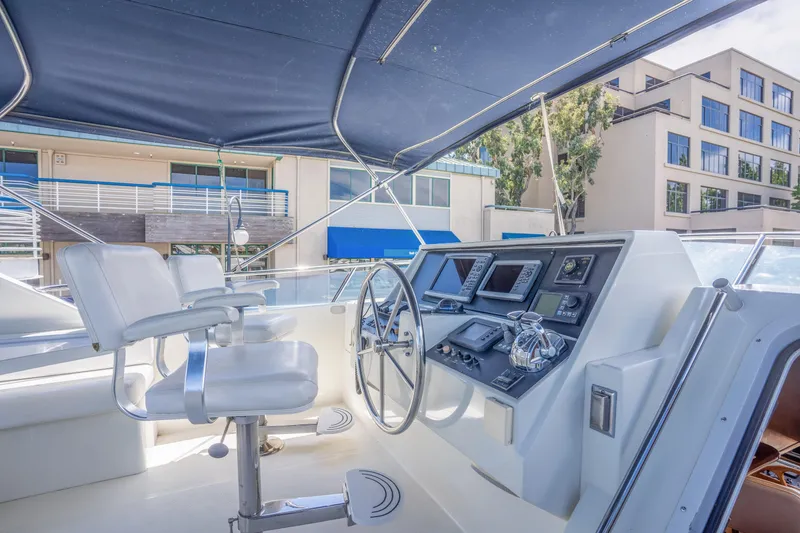 Slide: The Image of Helm of a 2002 Symbol 58 yacht with modern equipment. - 30