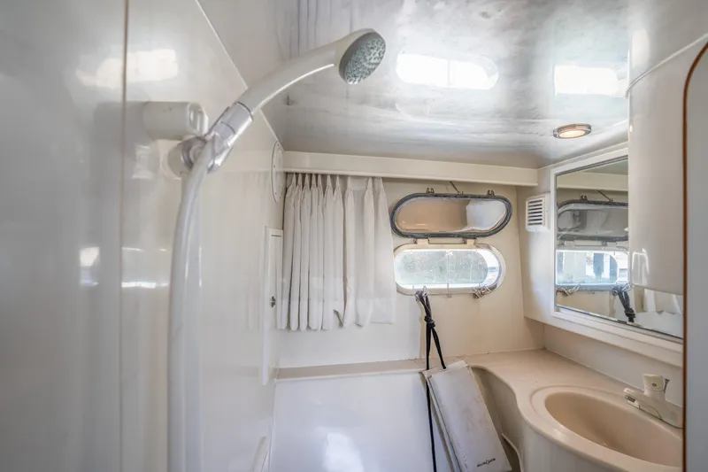 Slide: The Image of Bathroom in 2002 Symbol 58 yacht with shower and sink. - 33