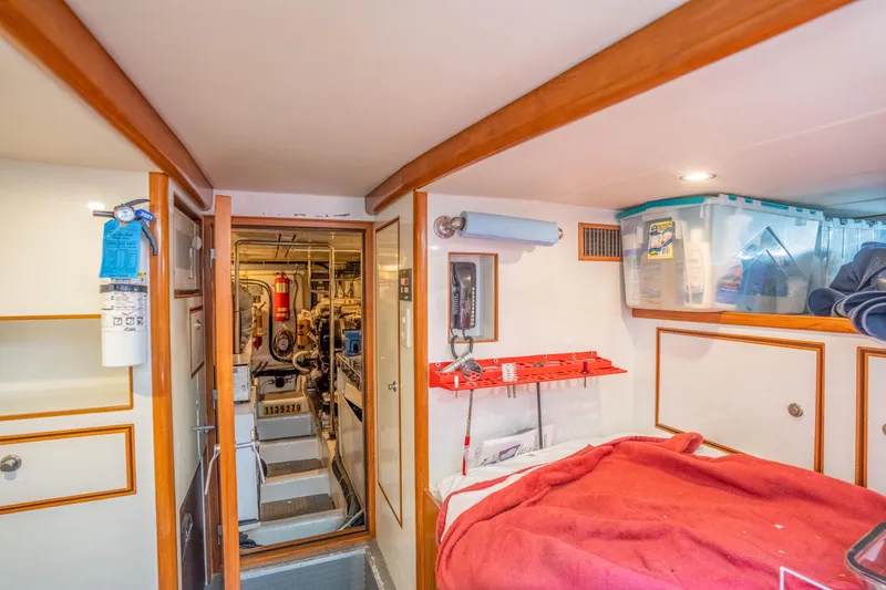 Slide: The Image of Interior of a 2002 Symbol 58 yacht with engine room. - 34