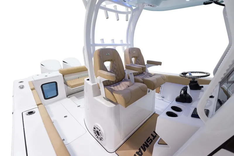 Slide: The Image of Manufacturer Provided Image: 2024 Sportsman Open 302 Center Console boat interior with dual captain's chairs and modern helm. - 15