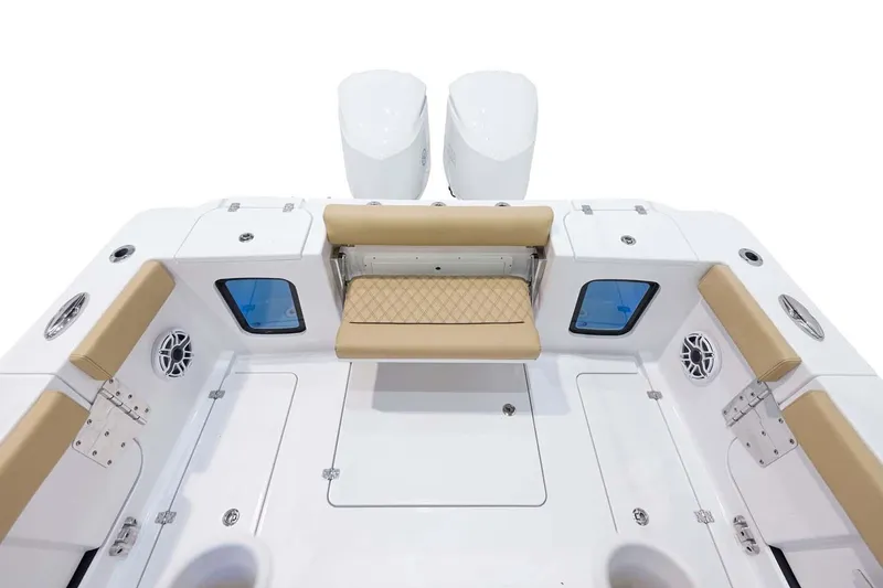 Slide: The Image of Manufacturer Provided Image: 2024 Sportsman Open 302 Center Console boat interior with seating and twin engines. - 21