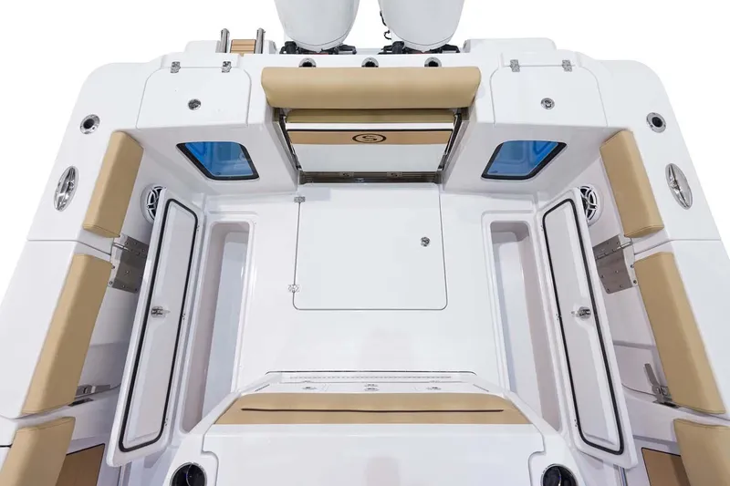 Slide: The Image of Manufacturer Provided Image: 2024 Sportsman Open 302 Center Console boat interior with seating and storage compartments. - 22