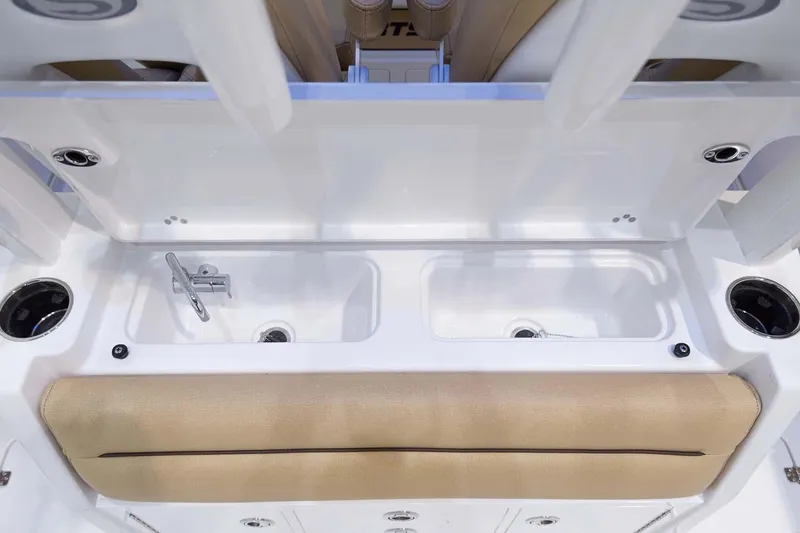 Slide: The Image of Manufacturer Provided Image: 2024 Sportsman Open 302 Center Console boat interior storage compartments. - 26