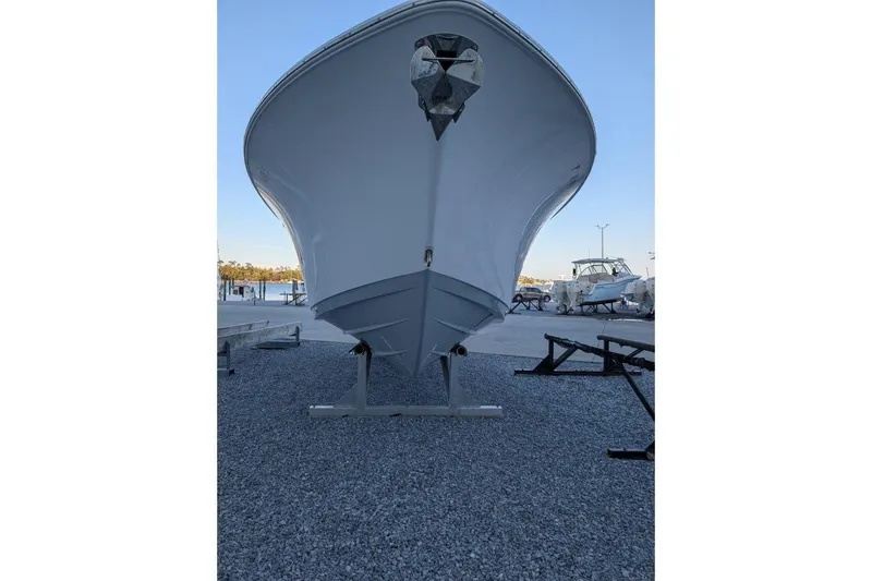 Slide: The Image of 2024 Sportsman Open 302 Center Console boat on display, front view. - 41