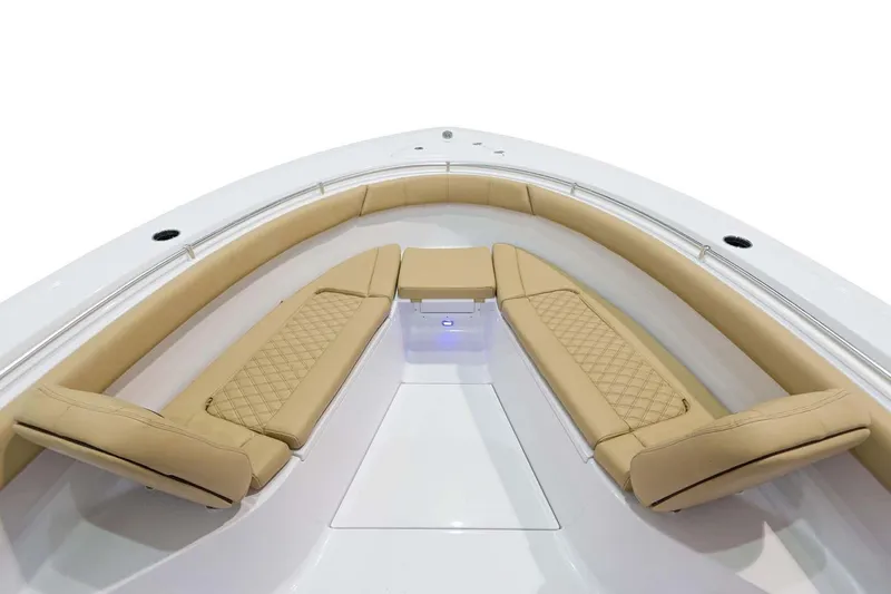 Slide: The Image of Manufacturer Provided Image: 2024 Sportsman Open 302 Center Console boat with tan cushioned seating. - 9