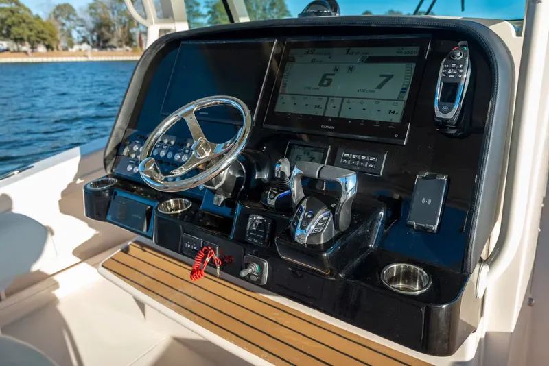 Slide: The Image of Grady-White Coastal Explorer 321 2026 - 6