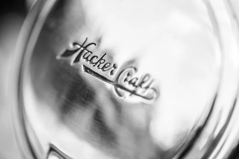 Slide: The Image of Close-up of 2007 Hacker-Craft 32 Sportabout logo on metallic surface. - 27