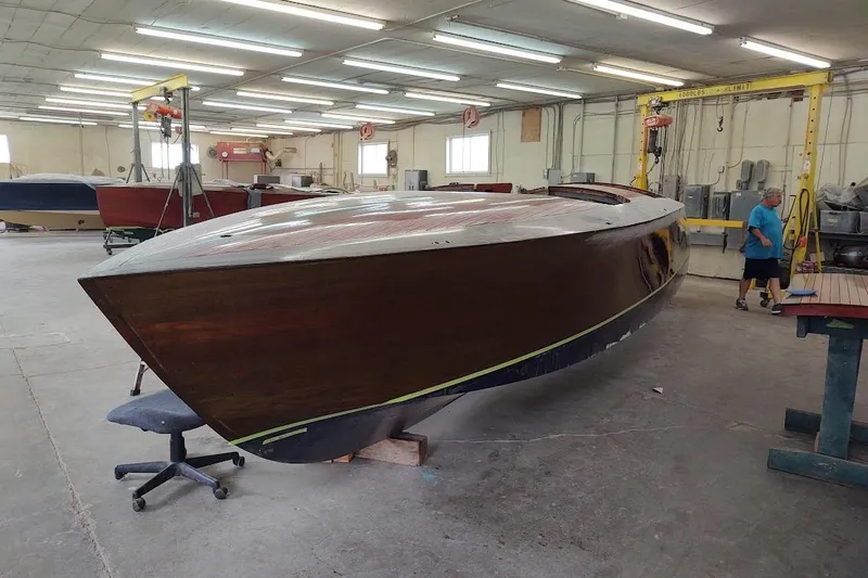 Slide: The Image of 2007 Hacker-Craft 32 Sportabout boat in workshop, under restoration. - 35