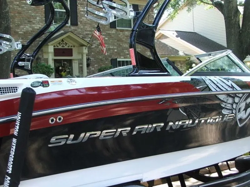 Slide: The Image of Correct Craft Super Air Nautique 230 2009 - 7