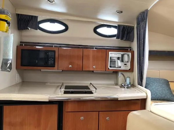 Slide: The Image of Wellcraft 330 Coastal 2004 - 1