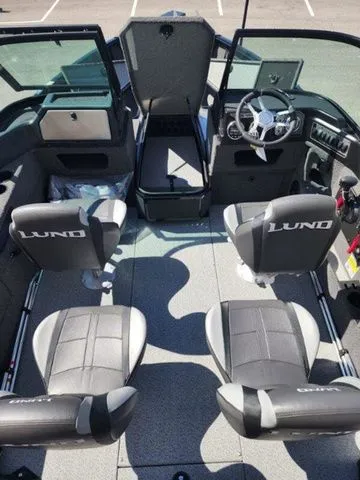 Slide: The Image of Interior view of 2026 Lund 1875 Impact XS Sport boat. - 4