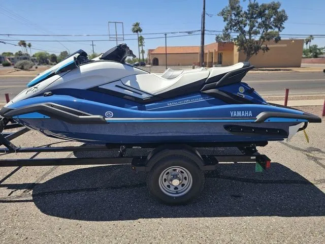 Slide: The Image of 2026 Yamaha WaveRunner FX HO on trailer, blue and white design. - 3