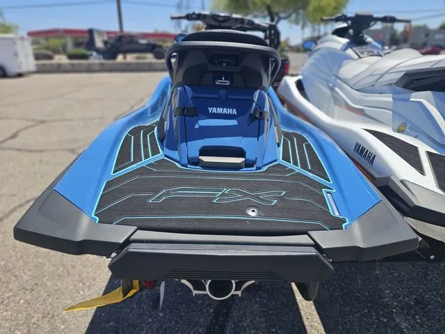 Slide: The Image of 2026 Yamaha WaveRunner FX HO in blue, rear view on parking lot. - 5