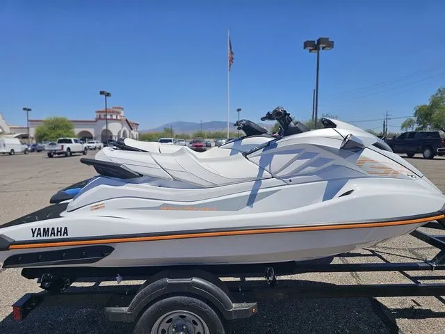 Slide: The Image of 2026 Yamaha WaveRunner GP parked on trailer outdoors. - 3