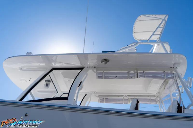 Slide: The Image of 2026 Front Runner 43 Catamaran, sleek design under clear blue sky. - 10