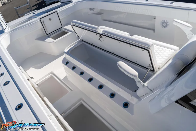 Slide: The Image of 2026 Front Runner 43 Catamaran interior with seating and storage compartments. - 21