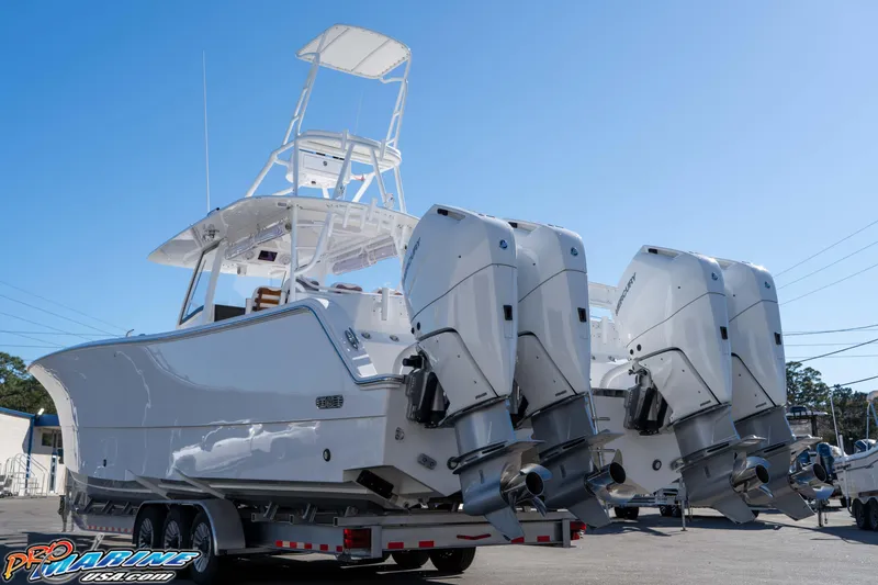 Slide: The Image of 2026 Front Runner 43 Catamaran with multiple outboard engines on a trailer. - 3