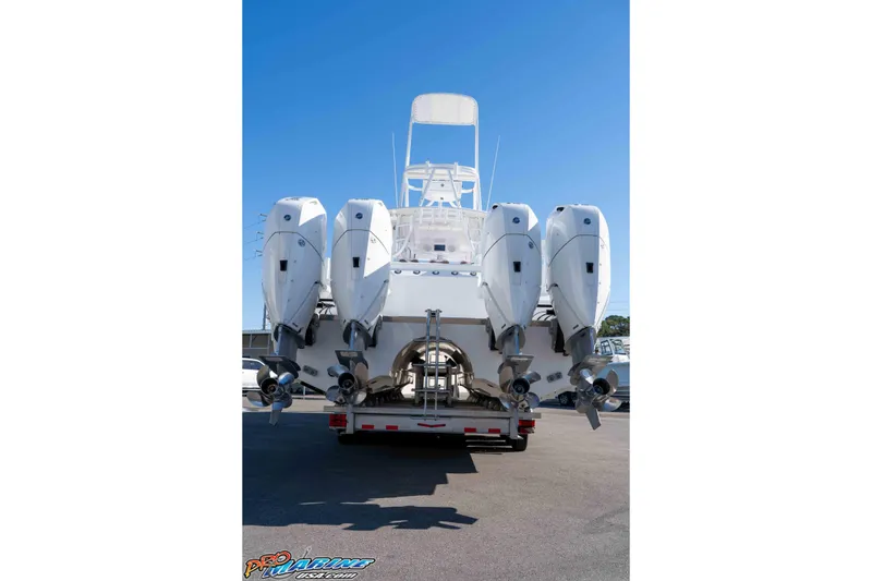 Slide: The Image of 2026 Front Runner 43 Catamaran with four powerful outboard engines on a trailer. - 4