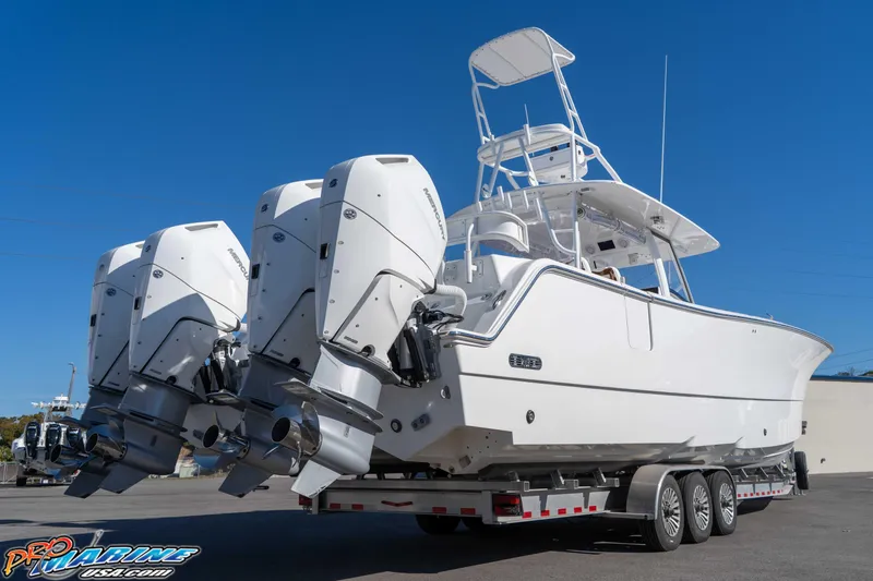 Slide: The Image of 2026 Front Runner 43 Catamaran with triple outboard engines on a trailer. - 5