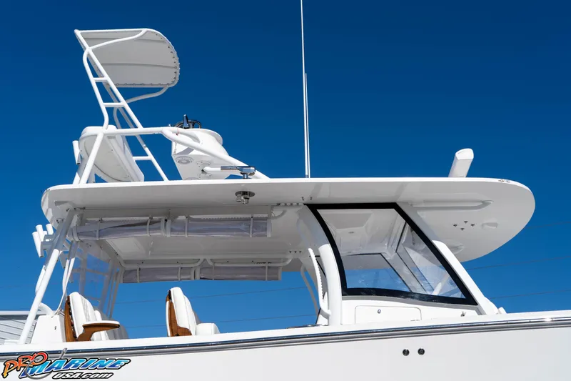Slide: The Image of 2026 Front Runner 43 Catamaran with sleek design and modern features against clear blue sky. - 8