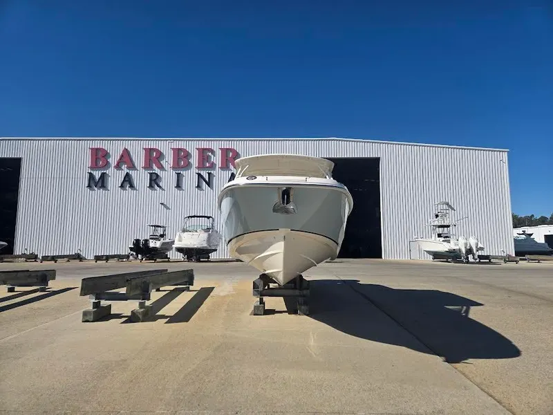 Slide: The Image of Boston Whaler 270 Vantage 2018 in front of Barber Marine warehouse. - 2