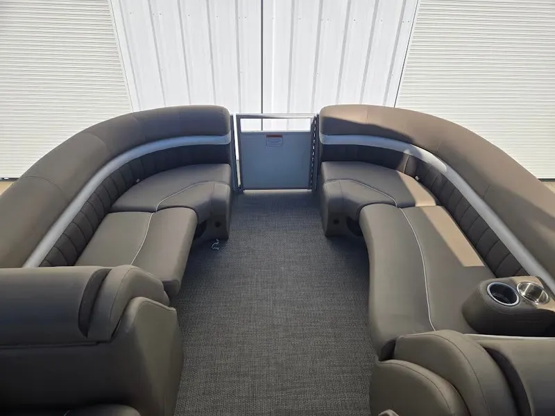 Slide: The Image of Interior of a 2021 Bennington LX24SBSD pontoon boat with gray seating. - 6